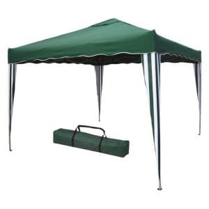 Gazebo pieghevole montato in giardino con telo bianco